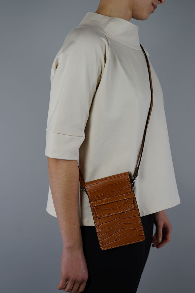 magazzino_designeroutlet_Minibag_AMY_Reptil_Optik_Der perfekter Begleiter - unsere stylische Minibag Kompakt und stylish, durch das elegante Leder in Reptil-Optik und die hochwertigen Metallaccessoires ist sie das perfekte Finish für Ihr Outfit. Auch passend für alle gängigen Mobiltelefone.