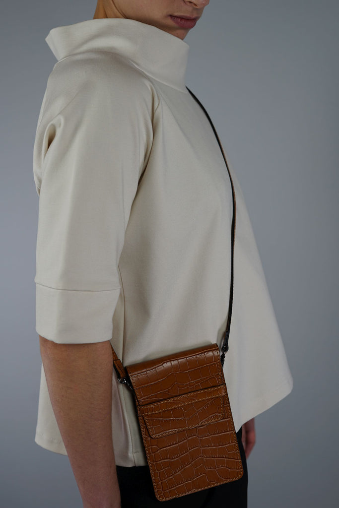 magazzino_designeroutlet_Minibag_AMY_Reptil_Optik_Der perfekter Begleiter - unsere stylische Minibag Kompakt und stylish, durch das elegante Leder in Reptil-Optik und die hochwertigen Metallaccessoires ist sie das perfekte Finish für Ihr Outfit. Auch passend für alle gängigen Mobiltelefone.
