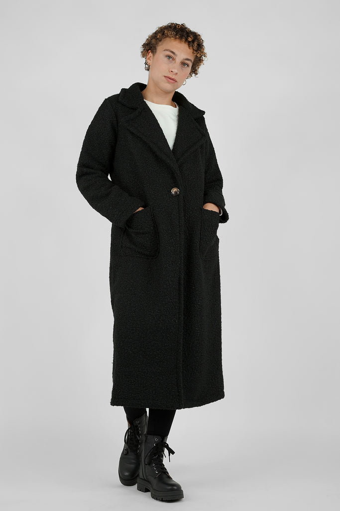 Langer Mantel in Bouclé-Optik in schwarz