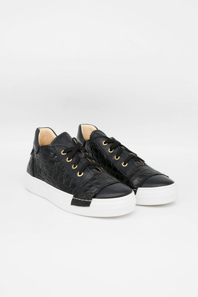 Sneaker im sportlichen Patchwork Style, mit breitem Lederband.