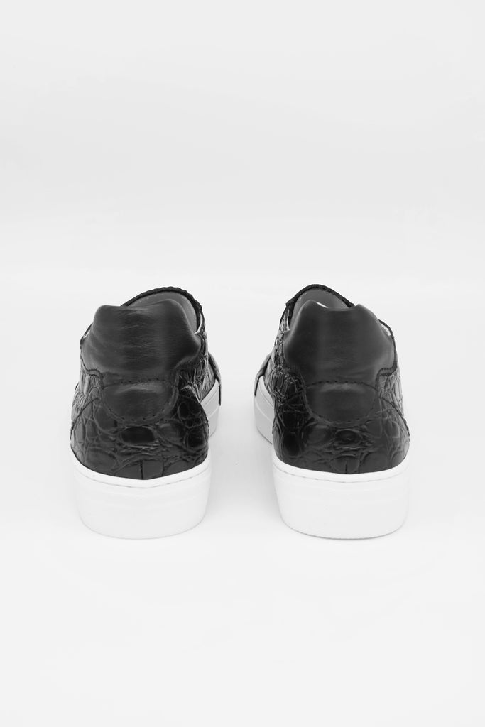 Sneaker im sportlichen Patchwork Style, mit breitem Lederband.